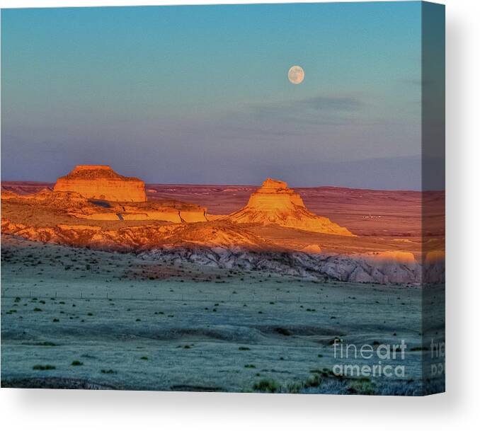 Pawnee Buttes Canvas Print featuring the photograph Sunset and Moon-rise over Pawnee Buttes by Harry Strharsky