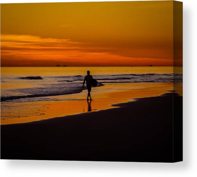 Newport Beach Canvas Print featuring the photograph Sunset Surfer by Pamela Newcomb