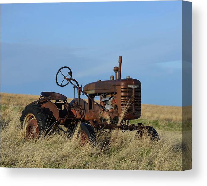 Antique Canvas Print featuring the photograph The Farmall Tractor by Whispering Peaks Photography
