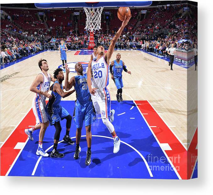 Nba Pro Basketball Canvas Print featuring the photograph Philadelphia 76ers V Orlando Magic by Jesse D. Garrabrant
