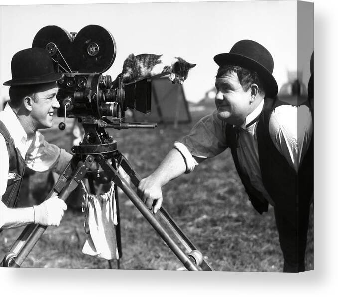 Oliver Hardy Canvas Print featuring the photograph OLIVER HARDY and STAN LAUREL in THE FINISHING TOUCH -1928-. #4 by Album