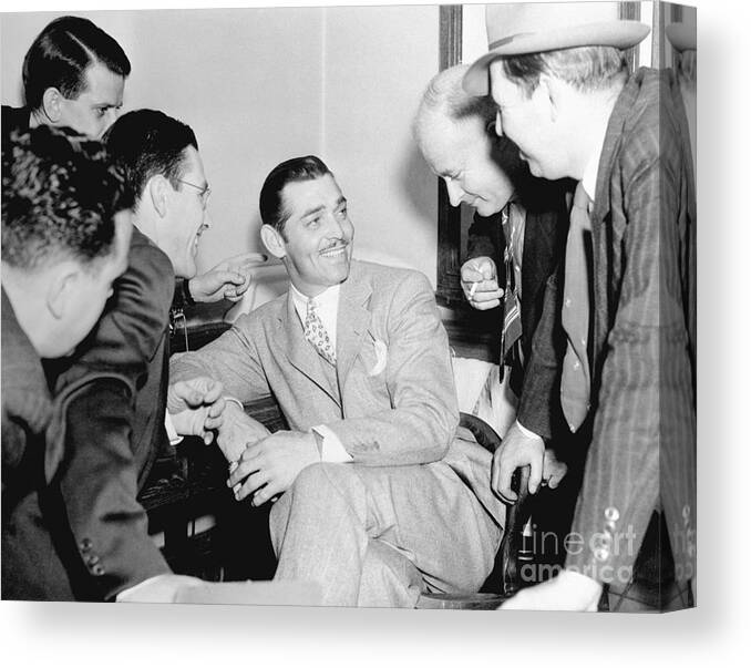 Child Canvas Print featuring the photograph Clark Gable Talking With Reporters by Bettmann