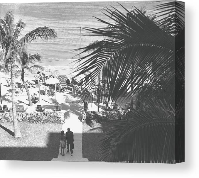 Heterosexual Couple Canvas Print featuring the photograph Couple Walking In Path Towards Beach by George Marks