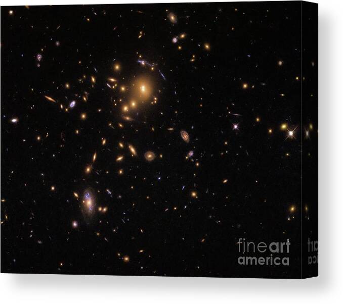 Galaxy Canvas Print featuring the photograph Distortion Of Light From Distant Galaxies By Galaxy Cluster by Nasa/esa/stsci/science Photo Library