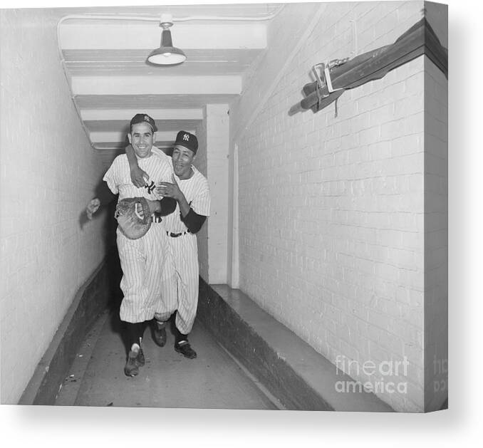 Following Canvas Print featuring the photograph Elston Howard Celebrating With Yogi by Bettmann