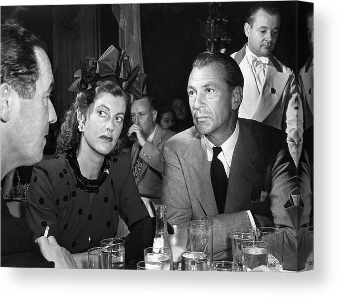 Listening Canvas Print featuring the photograph Gary Cooper And Wife by Alfred Eisenstaedt