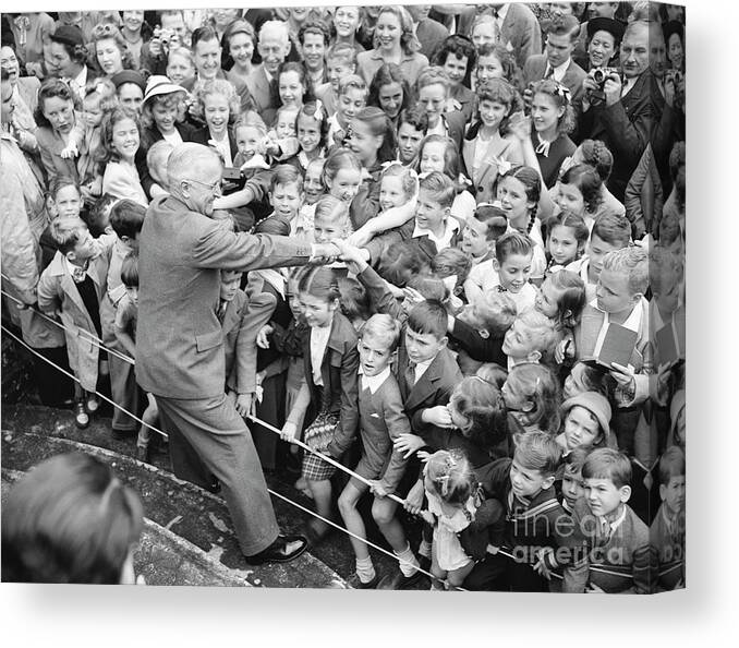 Crowd Of People Canvas Print featuring the photograph Harry S. Truman Greeting American by Bettmann