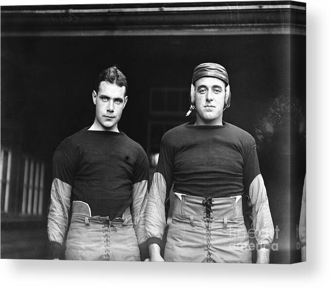 Following Canvas Print featuring the photograph Harvard Football Players Logan by Bettmann