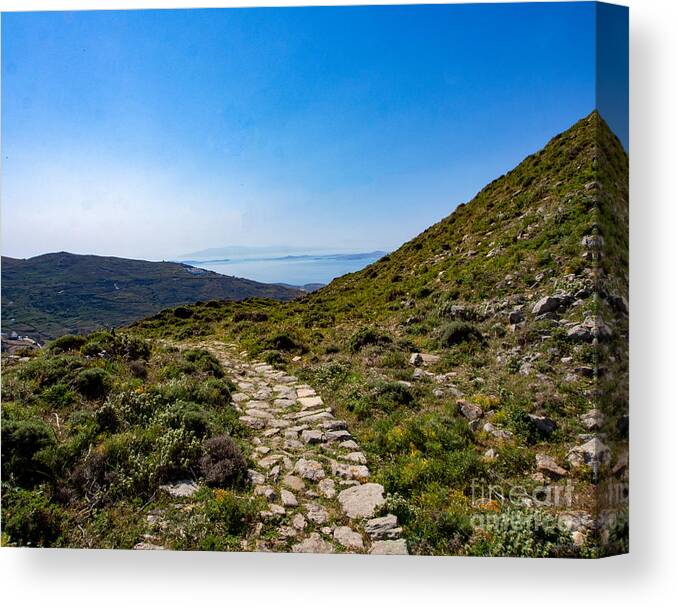 Hiking Trail Canvas Print featuring the photograph Hiking a rocky path on Island of Tinos in Greece by L Bosco