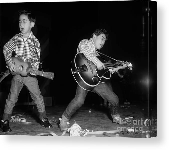 Rock Music Canvas Print featuring the photograph Japanese Boys Playing Rock Music by Bettmann