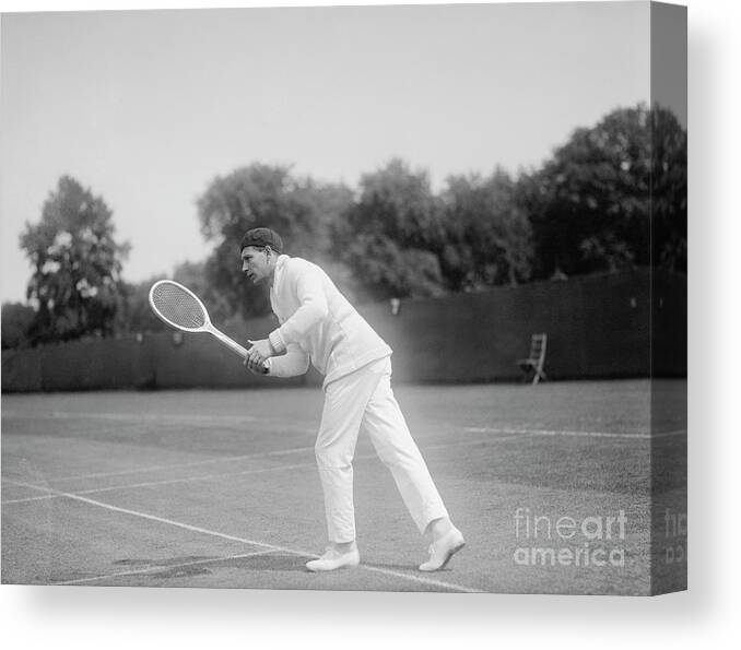 Tennis Canvas Print featuring the photograph Jean Borotra Holding A Tennis Racquet by Bettmann