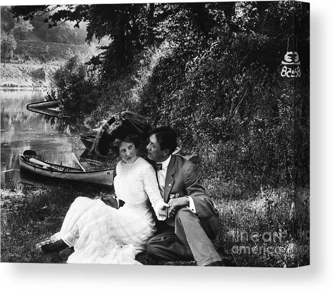 People Canvas Print featuring the photograph Lovers Relaxing Along The Shore by Bettmann
