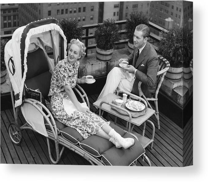 Heterosexual Couple Canvas Print featuring the photograph Mature Adults Eating And Drinking by George Marks
