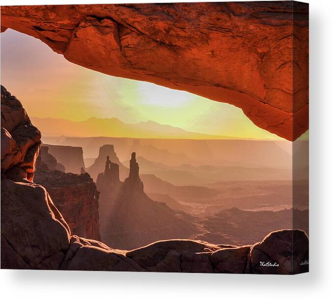 Mesa Arch Canvas Print featuring the photograph Mesa Arch at Sunrise, Washer Woman Formation , Canyonlands National Park, Utah by Tim Kathka