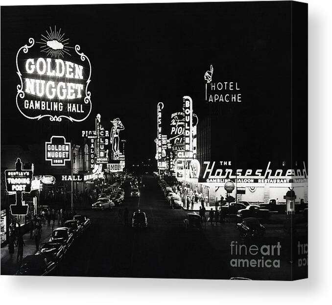 1950-1959 Canvas Print featuring the photograph Neon Casino Lights In Las Vegas by Bettmann