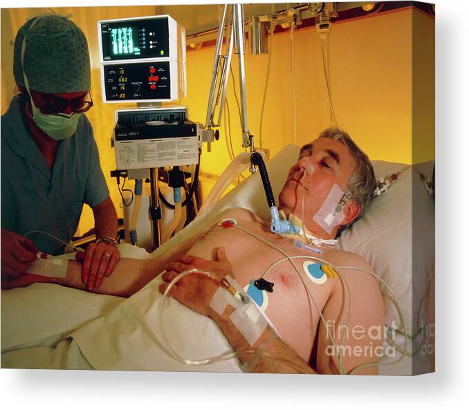 Icu Canvas Print featuring the photograph Nurse Attending Patient In Icu by Malcolm Fielding, The Boc Group Plc/science Photo Library