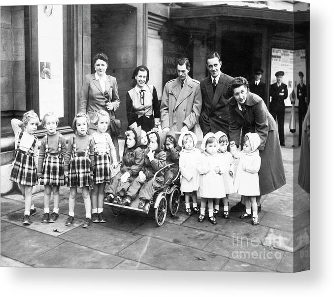 Event Canvas Print featuring the photograph Parents And Three Sets Of Quadruplets by Bettmann