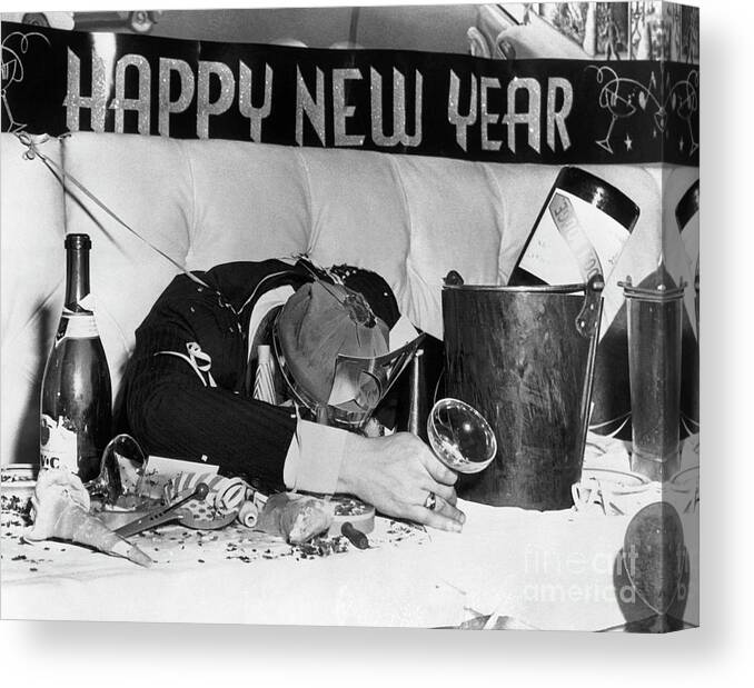 People Canvas Print featuring the photograph Passed-out New Years Eve Reveler by Bettmann