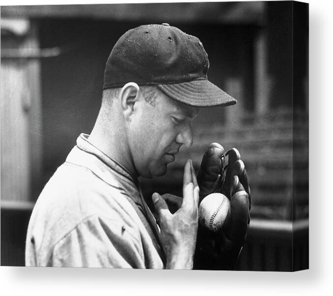 Spitting Canvas Print featuring the photograph Pitcher Burleigh Grimes Demonstrating by Bettmann