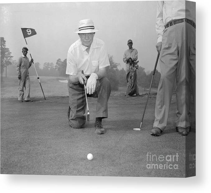 Mature Adult Canvas Print featuring the photograph President Eisenhower Playing Golf by Bettmann