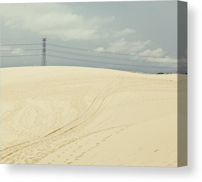 Scenics Canvas Print featuring the photograph Pylon Atop Sand Dune by Photograph By Chris Round