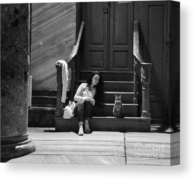 Girl And Cat Canvas Print featuring the photograph Small talk between girl and cat - Black and white by Yavor Mihaylov