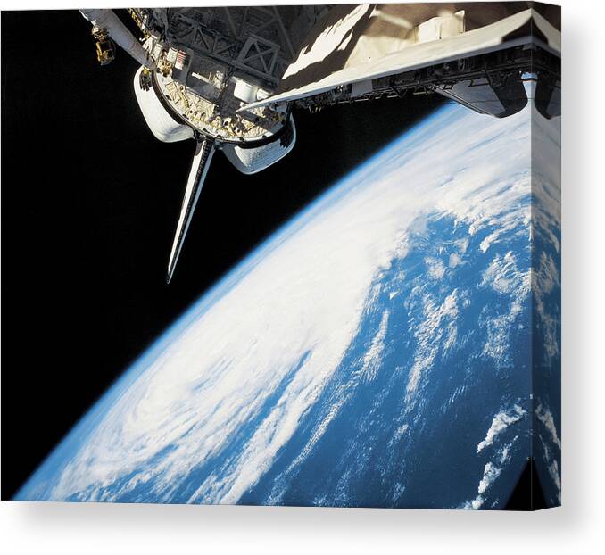 Research Canvas Print featuring the photograph Space Shuttle In Outer Space by Stockbyte