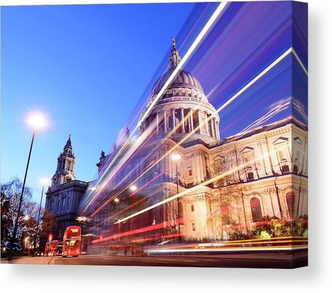 Blurred Motion Canvas Print featuring the photograph St Pauls Cathedral At Night London Uk by Deejpilot