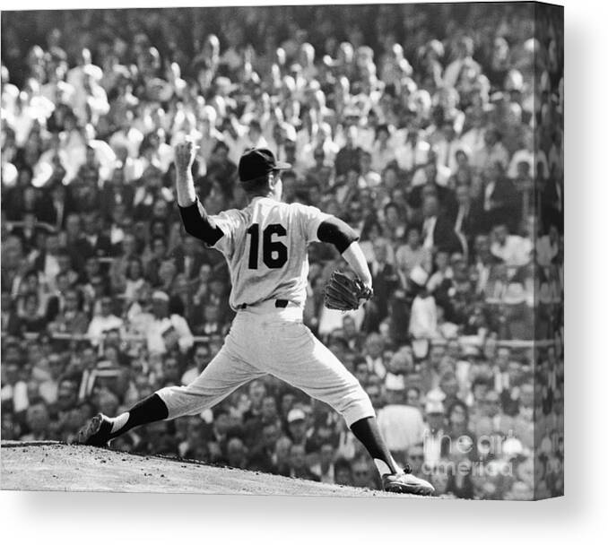 American League Baseball Canvas Print featuring the photograph Whitey Ford Winds Up by Robert Riger