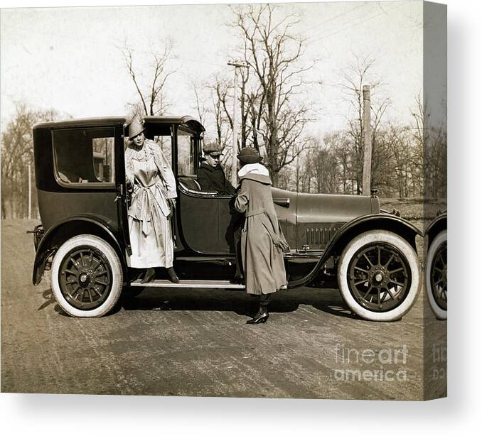 Mid Adult Women Canvas Print featuring the photograph Woman Leaving Hired Cadillac by Bettmann