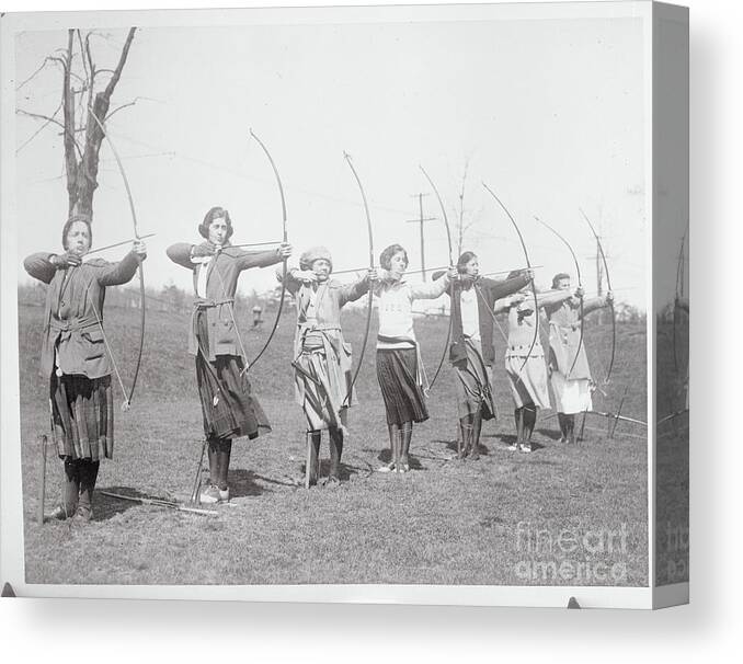 Child Canvas Print featuring the photograph Women Practicing Archery by Bettmann