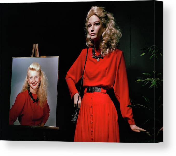 Mannequin Canvas Print featuring the photograph A real girl and a mannequin with a red dress. Rockland, ME 1988 by Roberto Bigano