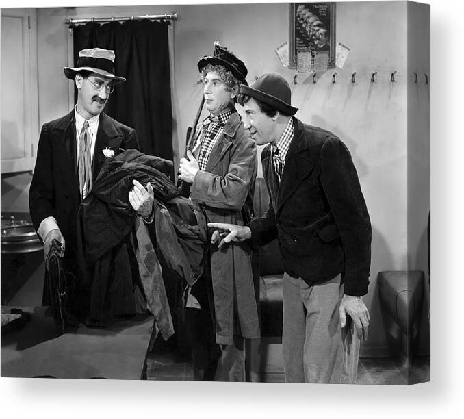 Chico Marx Canvas Print featuring the photograph HARPO MARX, THE MARX BROTHERS, CHICO MARX and GROUCHO MARX in AT THE CIRCUS -1939-. by Album