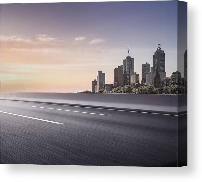 Downtown District Canvas Print featuring the photograph Inner City Road in Motion by Xin He