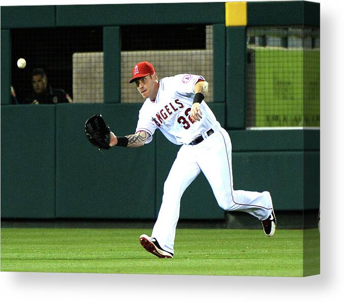 American League Baseball Canvas Print featuring the photograph Josh Hamilton and Dustin Ackley by Harry How