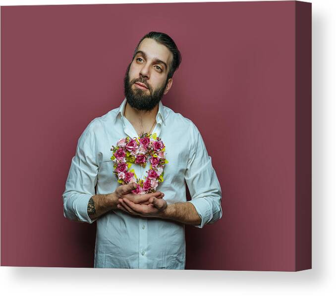 Young Men Canvas Print featuring the photograph Man holding small heart wreath by Ian Ross Pettigrew