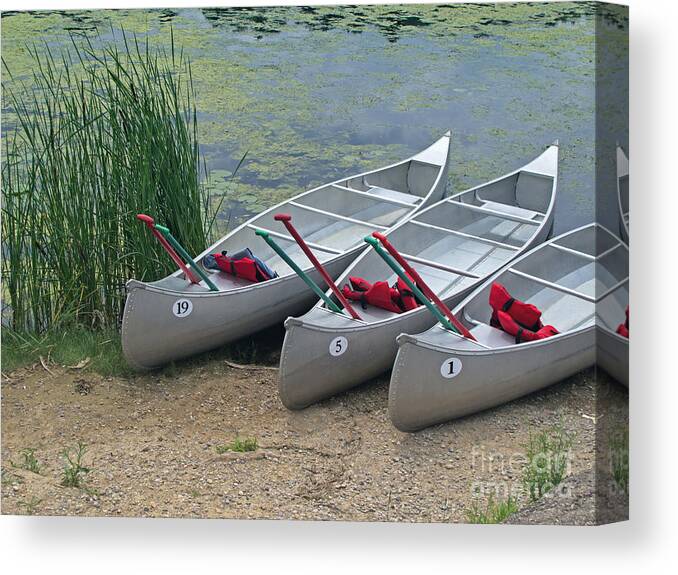 Canoes Canvas Print featuring the photograph Canoes to Go by Ann Horn