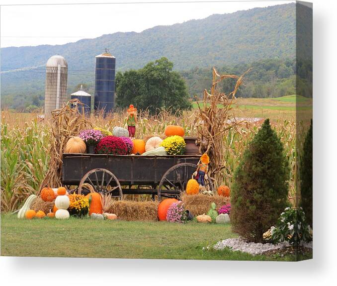 Autumn Canvas Print featuring the photograph Autumn Harvest in Wagon by Jeanette Oberholtzer
