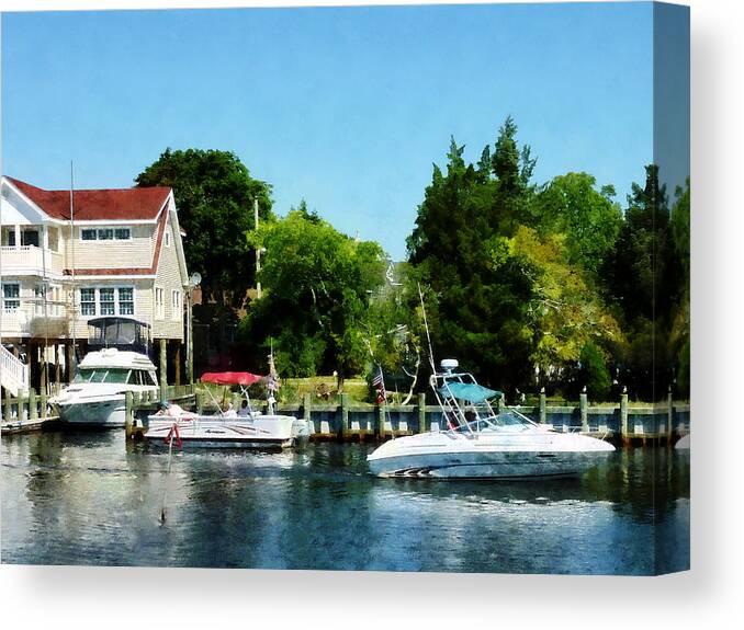 Boat Canvas Print featuring the photograph Cabin Cruisers by Susan Savad