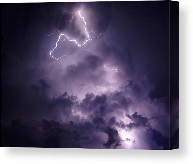 Nature Lightning Storm Storms Thunder Thunderstorm Thunderstorms Purple Bolt Bolts Cloud Clouds Strikes Strike Electric Electricity Black Weather Extreme Atmosphere Sky Night Nightscene Shock Shocking Rainstorm Rainstorms Powerful Power Thunderbolt Thunderbolts Majestic Night Scene Summer Flash Flashing Brilliant Dramatic Stormy Spectacular Dangerous Striking Danger Bright Outdoor Meteorology Beauty Heavenly Sold Sales Sale Severe Nighttime Awe Cloudscape Cloudscapes Voltage Cloudy Dark Awesome Canvas Print featuring the photograph Cloud Lightning by James Peterson