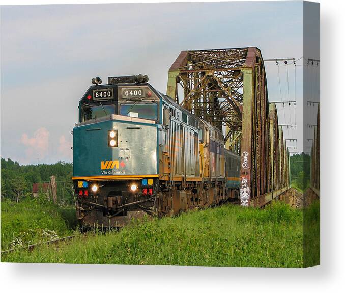 Train Canvas Print featuring the photograph VIA Train Crossing the Miramichi River by Steve Boyko