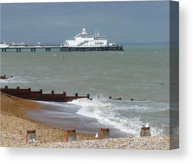 Eastbourne Pier Canvas Print featuring the photograph Eastbourne beach and pier by Phil Banks
