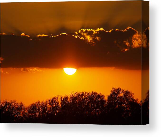 Sunset Photo Canvas Print featuring the photograph Emergence Of A Golden Sun by James Granberry