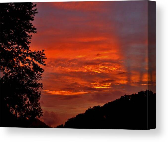  Canvas Print featuring the photograph Fire In The Sky by Hominy Valley Photography