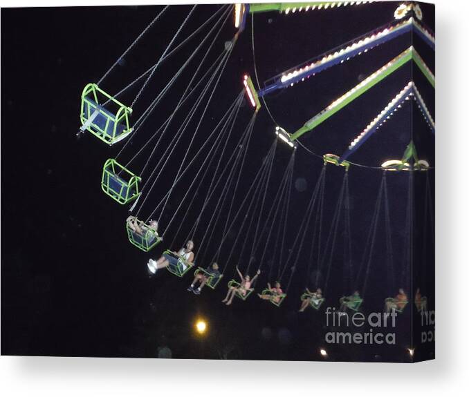 Happy Carnival Riders And Curious Orbs Canvas Print featuring the photograph Happy Carnival Riders and Curious Orbs by Paddy Shaffer