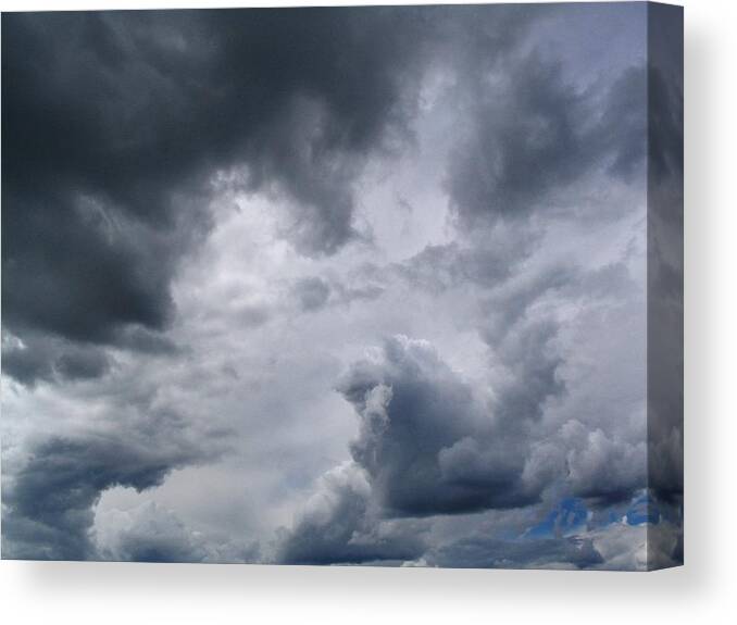 Clouds Canvas Print featuring the photograph Heaven Looks Angry by Vivian Martin