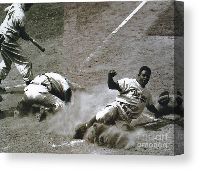 Jackie Robinson Canvas Print featuring the photograph Jackie Robinson sliding home by Vintage Collectables