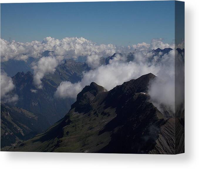 Mist Canvas Print featuring the photograph Mist From the Schilthorn by Nina Kindred