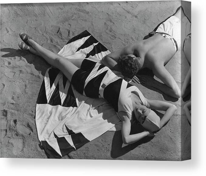 Fashion Canvas Print featuring the photograph Models Lying On A Beach by George Hoyningen-Huene
