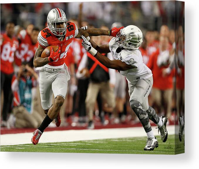 Sport Canvas Print featuring the photograph National Championship - Oregon V Ohio by Christian Petersen